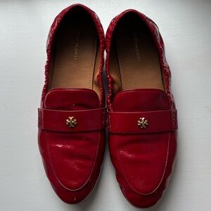 Tory Bur h Red Patent Leather Loafers with Gold Logo Accent